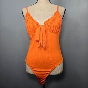The Kript Flame Orange Bodysuit Womens Size Medium Front Tie High Cut‎ Leg